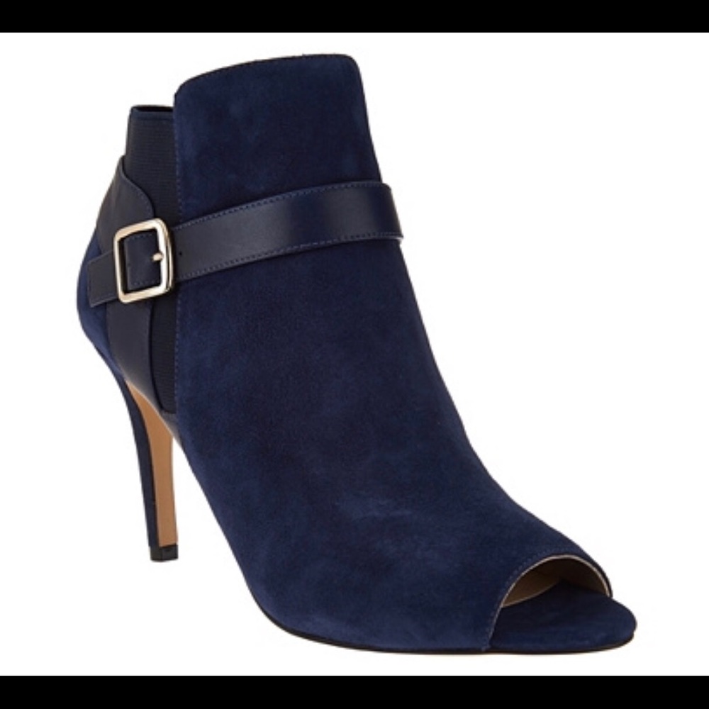 Navy blue suede high heel booties.